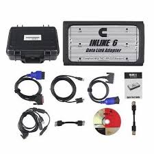 Collection of automotive parts including a box, cables, and connectors on a white background