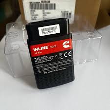 Black and red inline filter with Cummins logo on a white surface